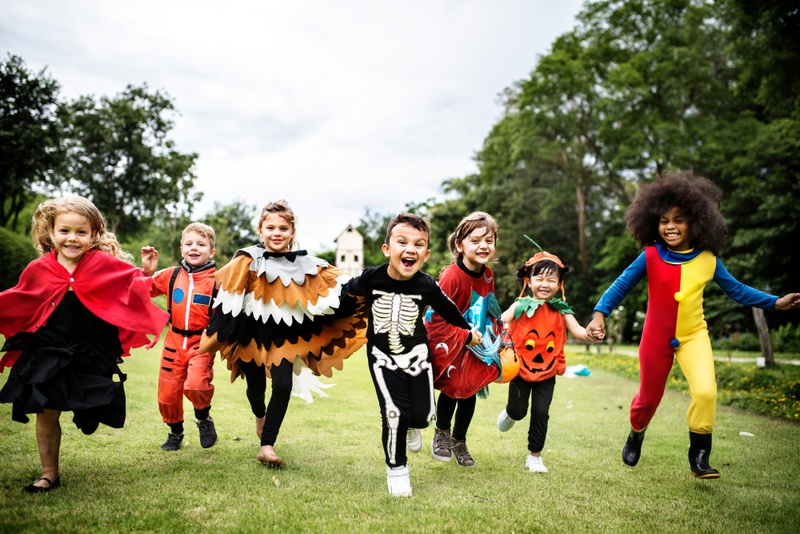 kids playing in Halloween dresses